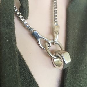 Unique silver large box chain neck.